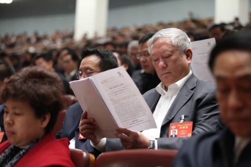 3月12日，十二屆全國人大五次會議在北京人民大會堂舉行第三次全體會議。這是全國政協(xié)委員列席會議。新華社記者 金立旺攝。