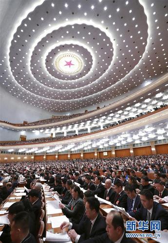 　　3月12日，十三屆全國人大二次會議在北京人民大會堂舉行第三次全體會議。 新華社記者 龐興雷 攝